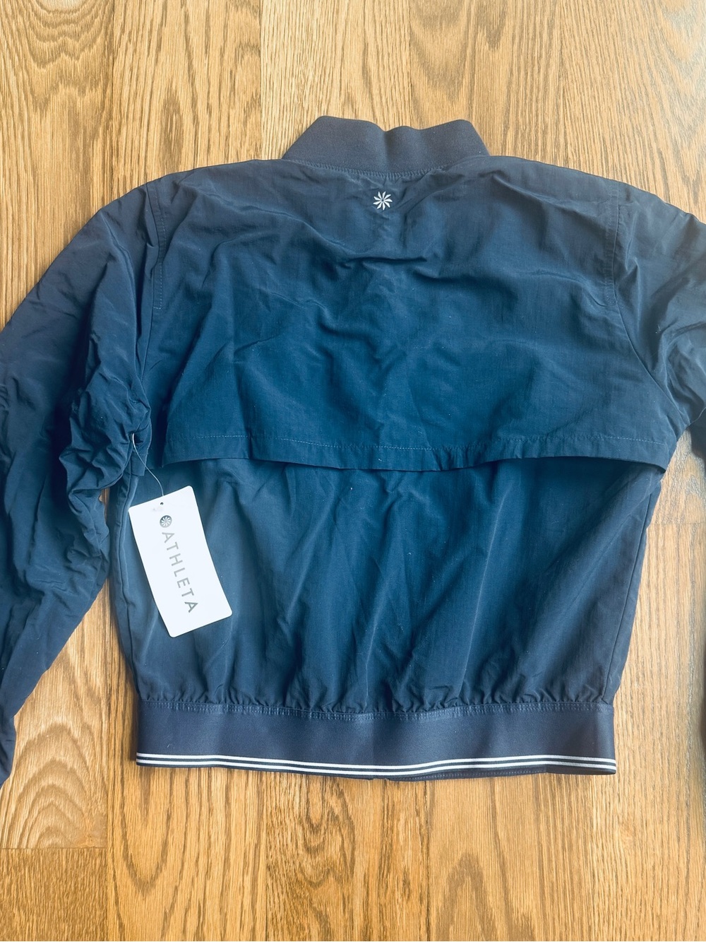 Athleta dark navy Bomber Jacket with Script Logo size XS